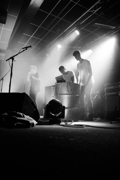 istock Yonung rock band in action on stage 990284974