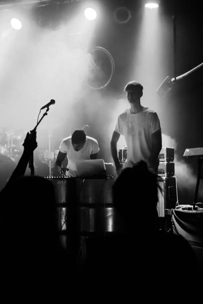 istock Yonung rock band in action on stage 990285112