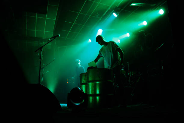 istock Yonung rock band in action on stage 990285234