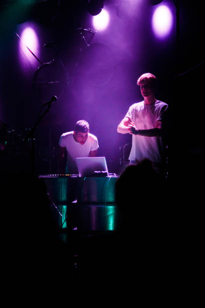 istock Yonung rock band in action on stage 990285354