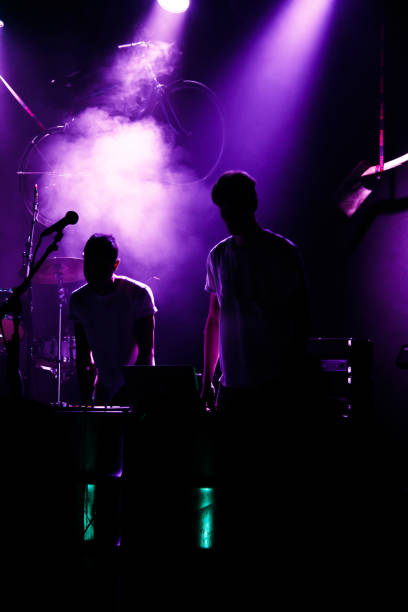 istock Yonung rock band in action on stage 990285514