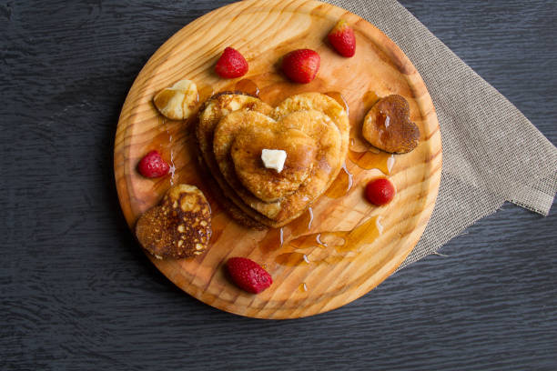 Hot heart pancake with strawberry and maple syrupHot heart pancake with strawberry and maple syrup