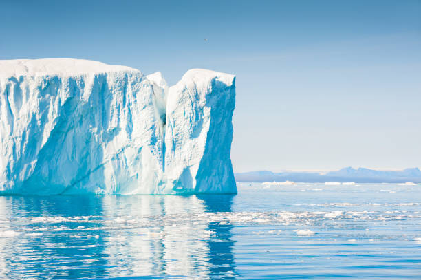 Big icebergs in Ilulissat icefjord, Greenland Big blue icebergs in Ilulissat icefjord, western Greenland ilulissat icefjord stock pictures, royalty-free photos & images