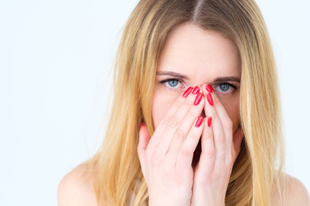 istock emotion face sad upset woman covering face hands 990306604