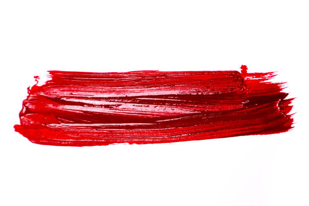 istock Red color lipstick stroke on white background 990311960