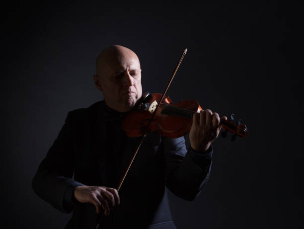 istock Older male violinist. 990319846