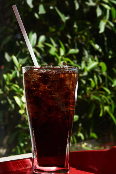 istock A glass of iced soda on the table 990337688