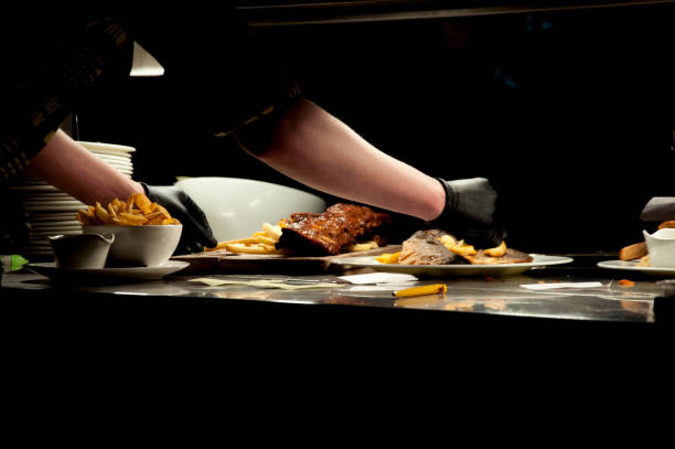 istock Service of serving food in restaurant 990342444