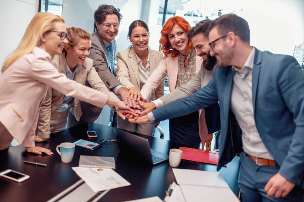 istock Positive business team working together 990347332