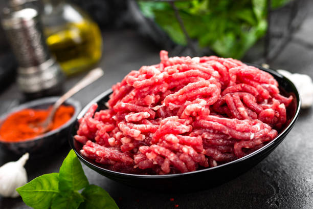 istock Raw ground beef meat. Fresh minced meat 990370564