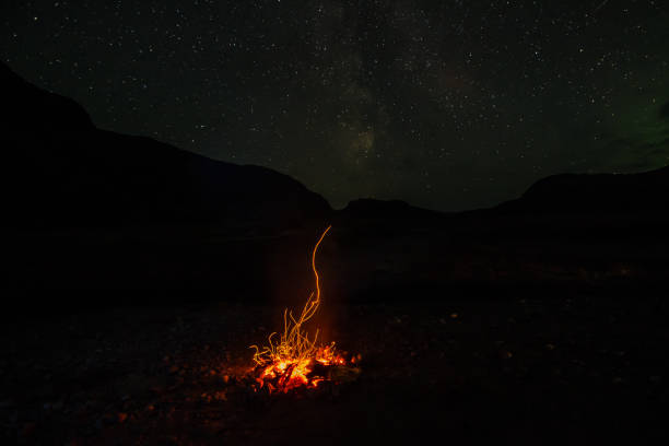 istock Campfire under the stars in campsite 990370898