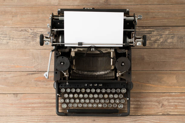 istock Top view of retro style typewriter in studio 990382670