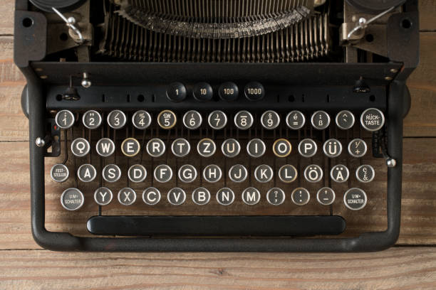 istock Top view of retro style typewriter in studio 990382740