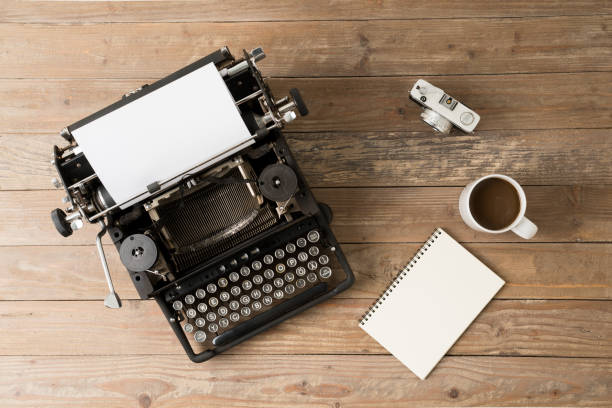istock Top view of retro style typewriter in studio 990382756