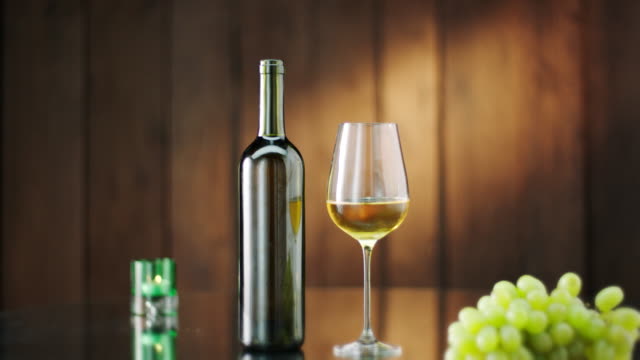 Bottle and glass of white wine