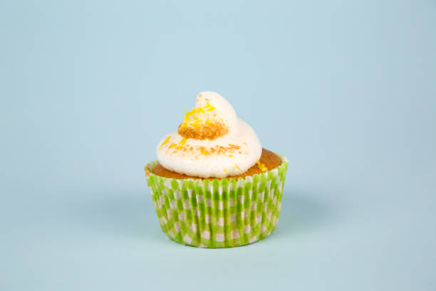 istock Cake Cupcake Food Dessert Single Small Cupcake with white icing 990383316