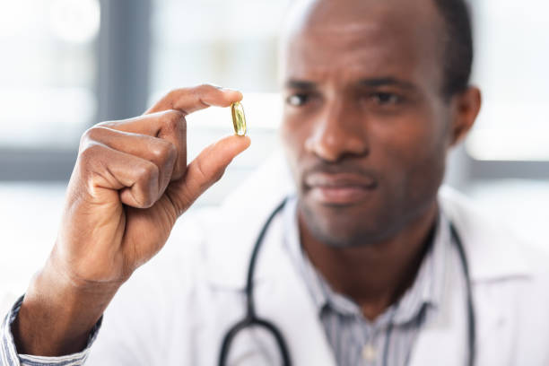 istock Focused photo on male hand that keeping pill 990398670