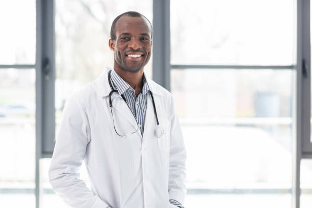 istock Pleased international man being at work 990399208