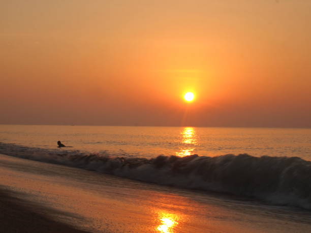 istock Slow shutter seascape view and beautiful sunrise 990401762