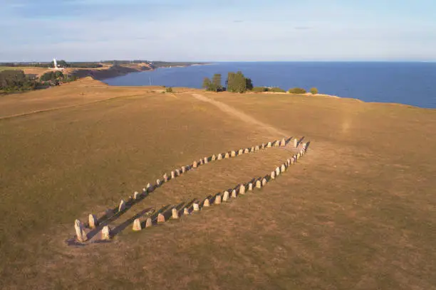 Aerial view of the stone ship Ales stones formed by 59 large boulders and 67 m long located at Kaseberga  in the Swedish province of Scania.