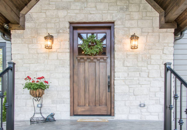 istock Beautifully symmetric and inviting front exterior 990449916
