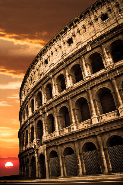istock Colosseum Sunrise Sunset 990457858