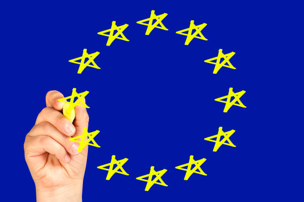 istock Hand drawing star on european union flag 990458298