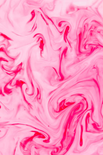 istock Abstract pink background on liquid, texture with paints, white pink pattern for designer, abstract pattern of food dyes on milk, blank for designer, art 990461970
