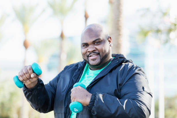 istock Mature African-American man exercising 990466480