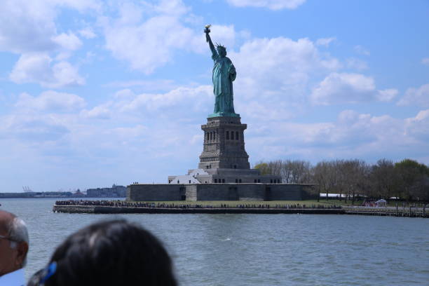 istock Statue of Liberty from a distance 990466596