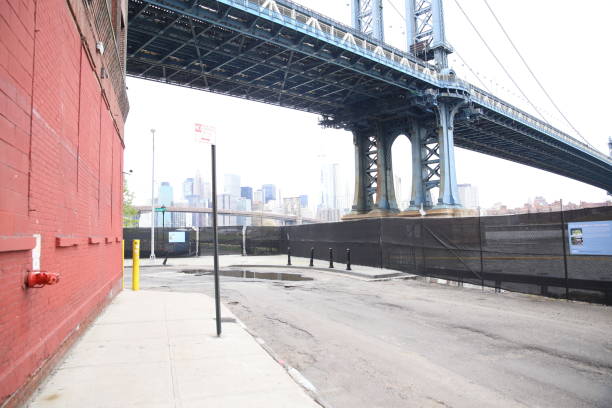 istock Manhattan Bridge and side of building in DUMBO, Brooklyn 990466724