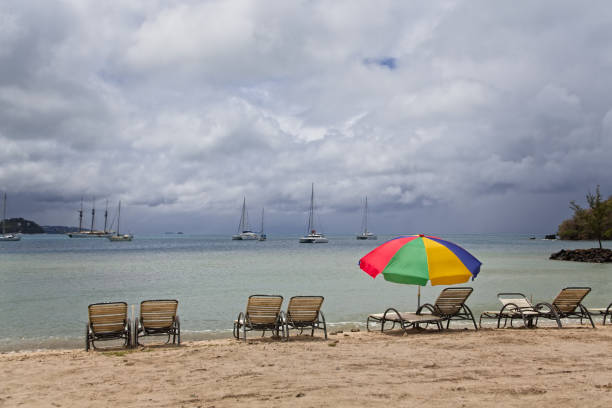 istock Chaise Lounges and Beach Umbrella 990470158