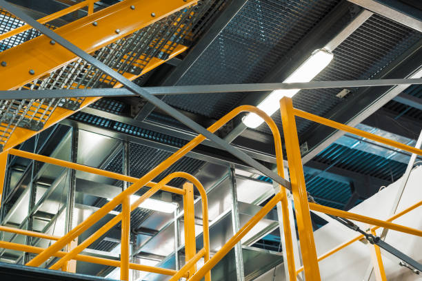 istock Metal staircase, industrial abstract interior 990472772