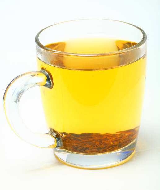 istock Glass cup of black tea on white background. 990479288
