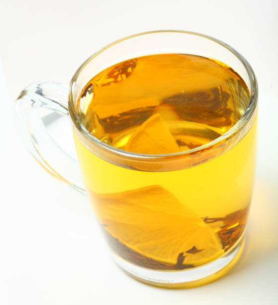 istock Glass cup of black tea on white background. 990479312