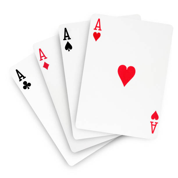 istock Top view of four aces semi-overlapped on white 990480276