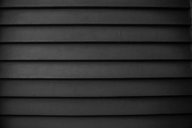 Black Weatherboarding Textured Wall Black Weatherboarding Textured Smooth Wall Texture siding building feature photos stock pictures, royalty-free photos & images
