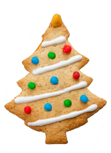istock Home made decorated christmas tree biscuit isolated white 990493138
