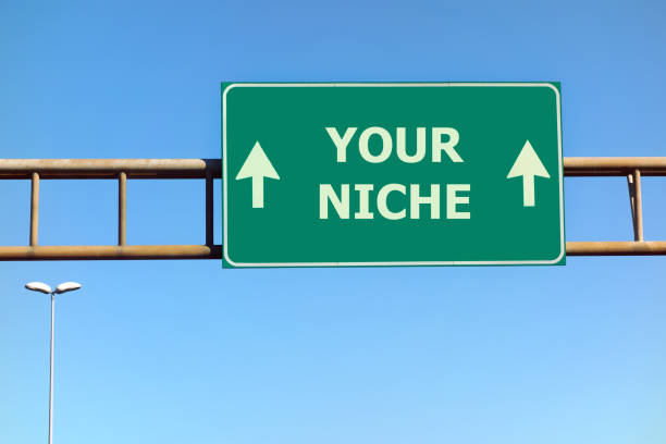 Your niche text on green road sign Your niche text on green road sign niche photos stock pictures, royalty-free photos & images