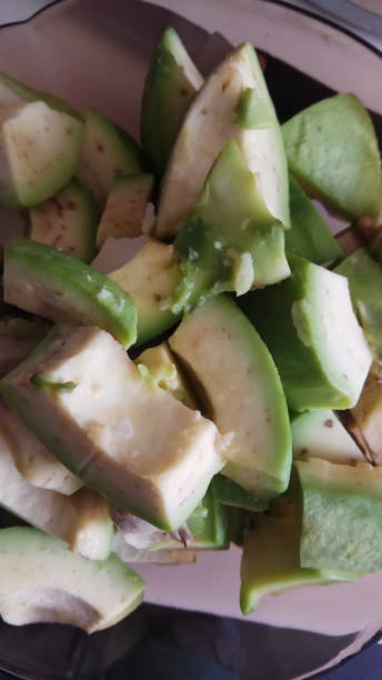 istock Avocado chunks in bowl, close-up 990506276