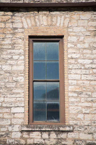 old brick wall with a window - mullion windows imagens e fotografias de stock