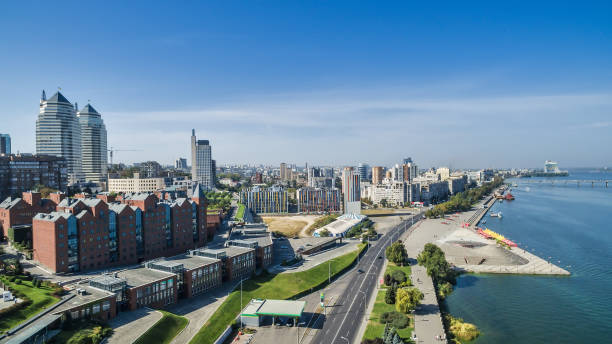 Aerial view on the modern Ukrainian city of Dnieper Aerial view on the modern and well-groomed Ukrainian city of Dnieper (Dnipropetrovsk) located on the bank of the big river. dnipropetrovsk stock pictures, royalty-free photos & images