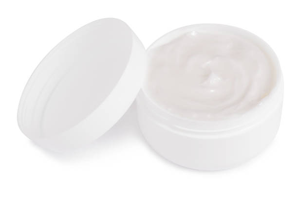 istock White jar of cream for a body 990542652