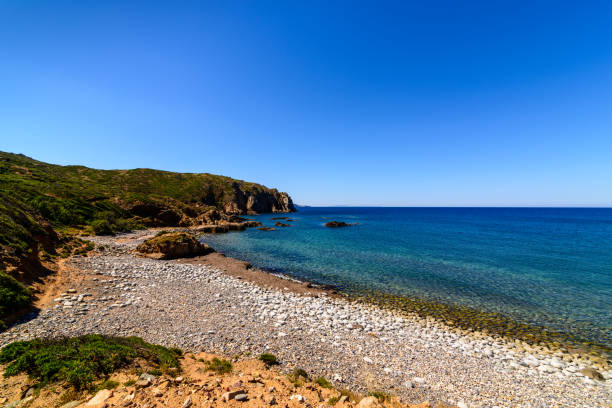 Stony Coast At Capo Pecora Buggerru Sardinia Italy Europe Landscape of the coast from Capo Pecora. Stony Coast At Capo Pecora Buggerru Sardinia Italy Europe Buggerru stock pictures, royalty-free photos & images