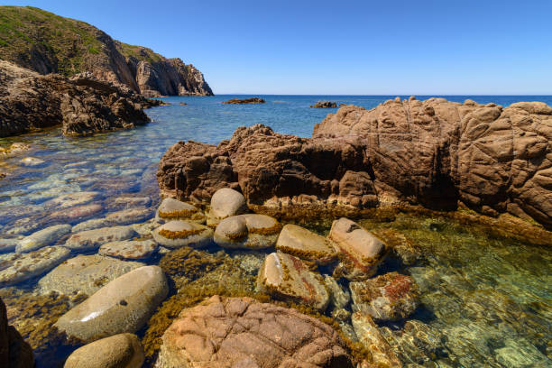 Stony Coast At Capo Pecora Buggerru Sardinia Italy Europe Landscape of the coast from Capo Pecora. Stony Coast At Capo Pecora Buggerru Sardinia Italy Europe Buggerru stock pictures, royalty-free photos & images