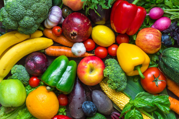 assortment of fresh harvested fruits and vegetables on the table - zucchini vegetable squash market imagens e fotografias de stock