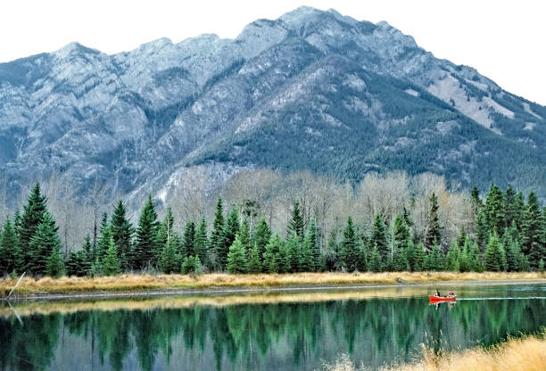 istock Bow River in Banff and two canoeing 990560870