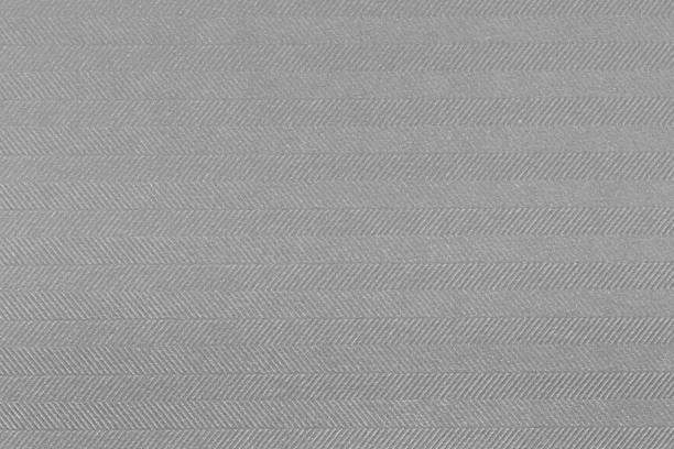 istock Gray grunge surface empty parchment sheet. Dirty art poster abov 990565586