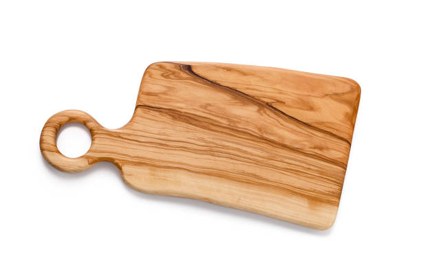 istock Wooden cutting board isolated on white background 990576624