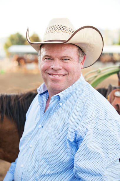 istock Portrait of A Smiling Cowboy 990576730